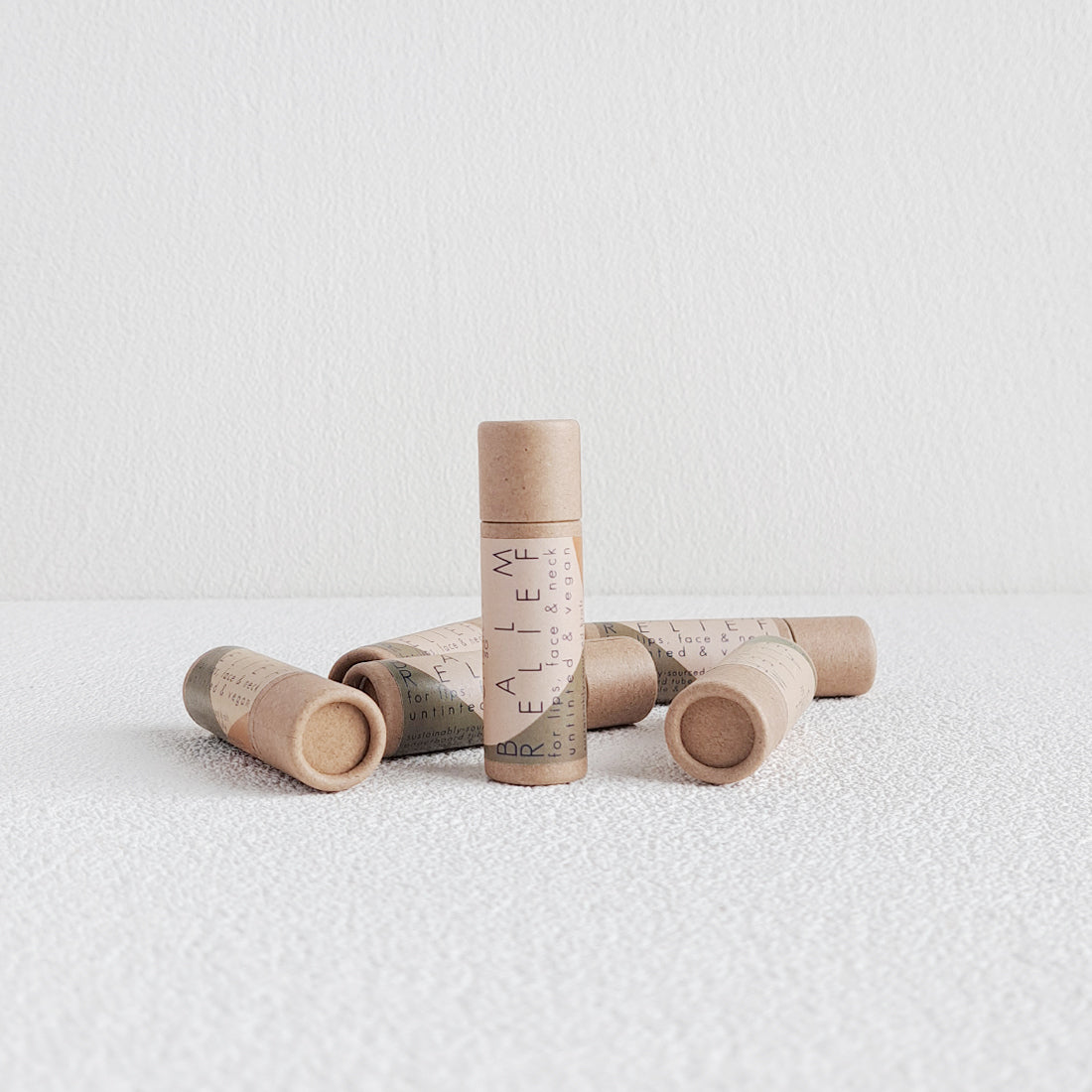 untinted unscented hypoallergenic vegan lip balm in eco-friendly compostable tube