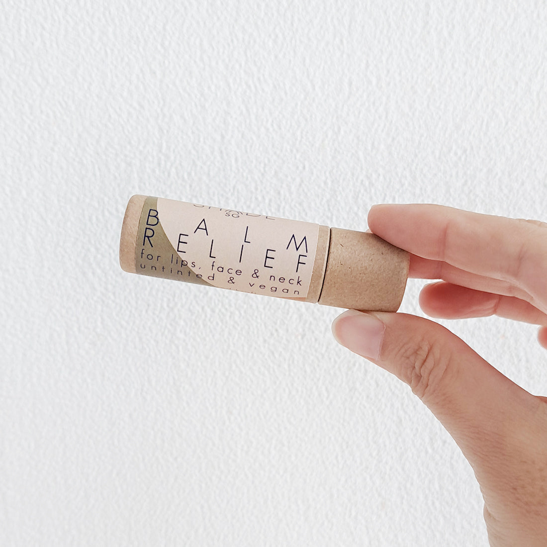 untinted unscented hypoallergenic vegan lip balm in eco-friendly compostable tube